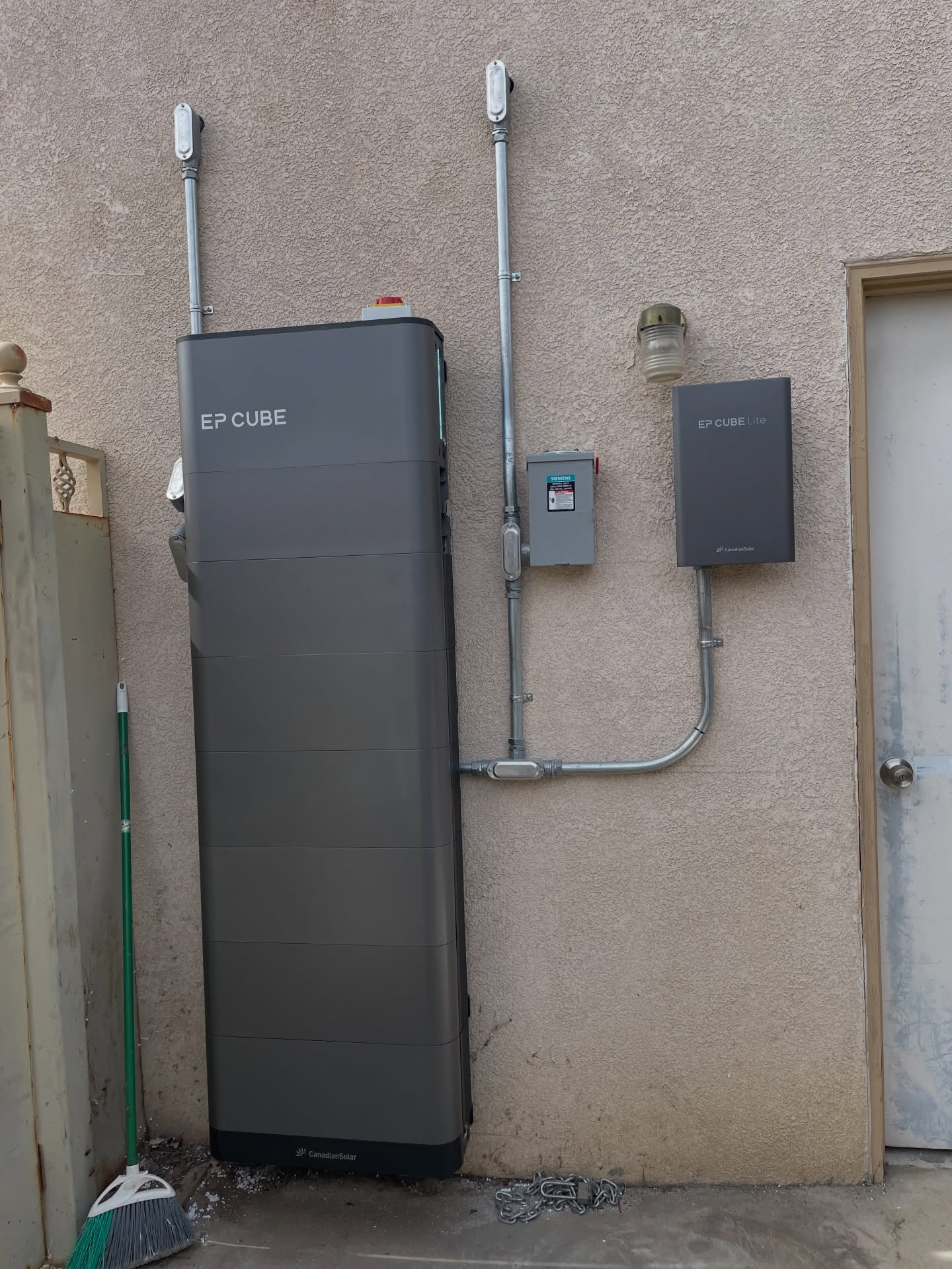 Battery storage hardware installed on a home exterior wall
